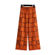 Modern Orange Knit Wide-Leg Pants with Black Grid Pattern